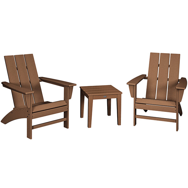 A POLYWOOD teak Adirondack chair set with table on an outdoor patio.