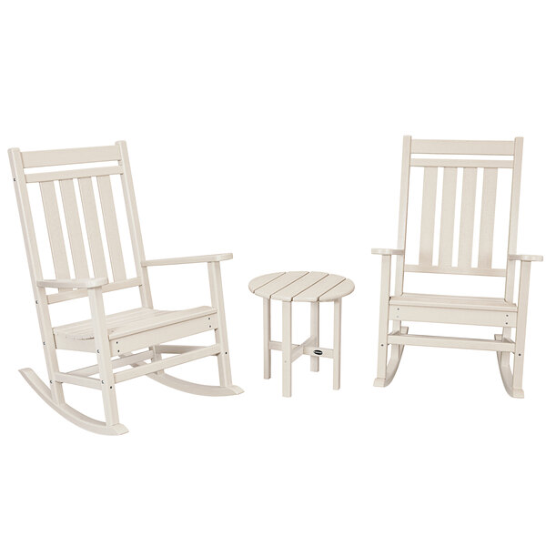 A white POLYWOOD rocking chair and table set.
