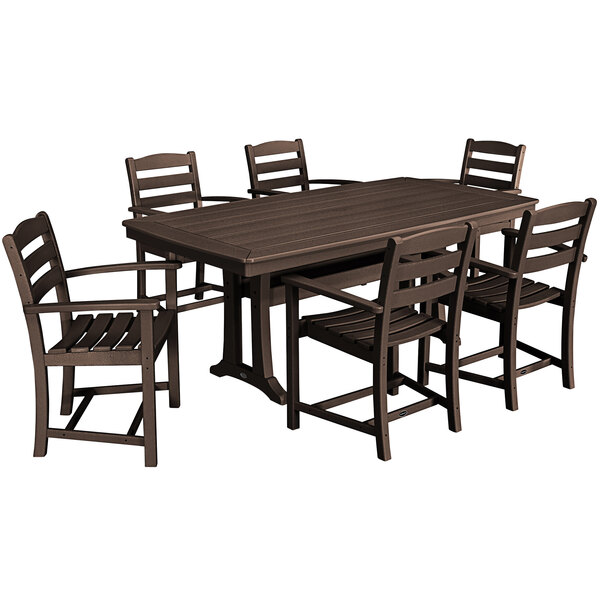 A POLYWOOD mahogany outdoor dining table with six armchairs.