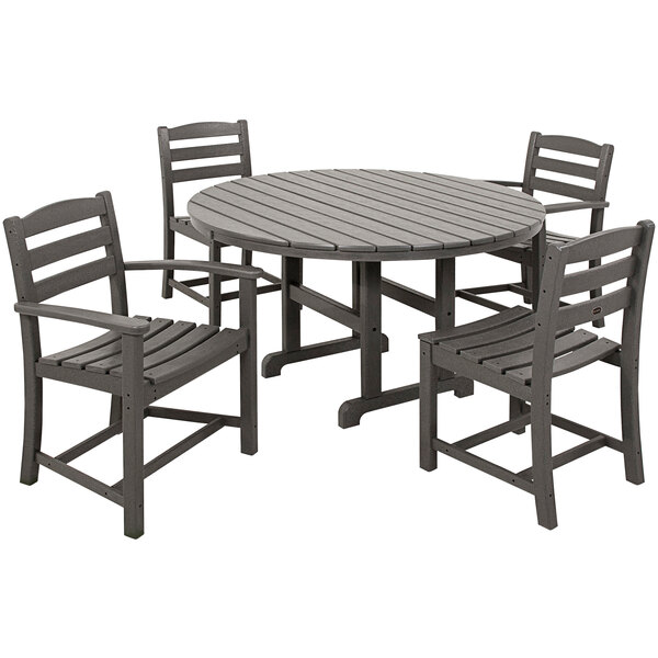 A POLYWOOD outdoor dining table with 2 arm chairs and 2 side chairs.