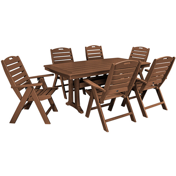A POLYWOOD teak table with six folding chairs.