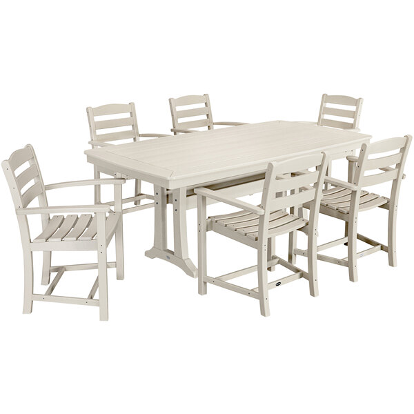 A white POLYWOOD outdoor dining table with 6 chairs.