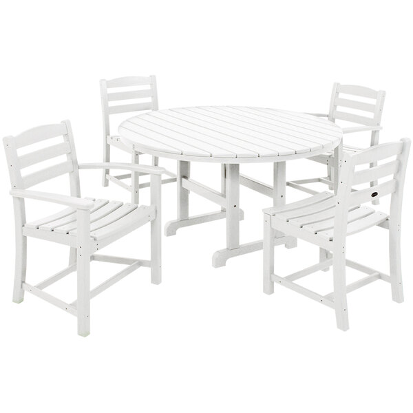 A white POLYWOOD La Casa Cafe table with two arm chairs and two side chairs.