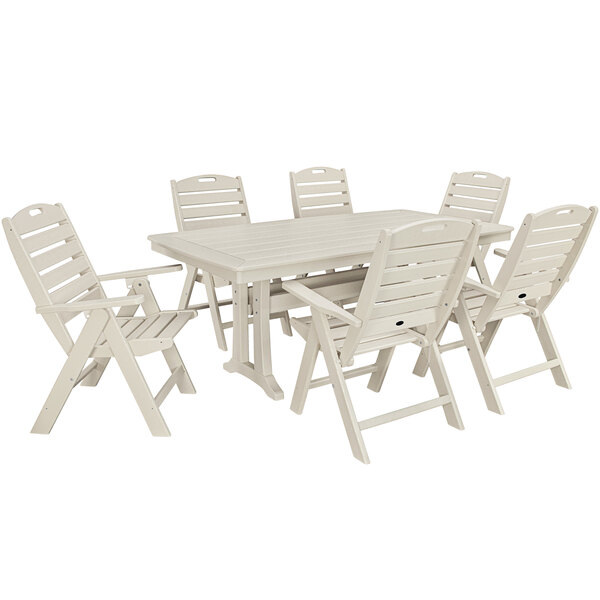 A white POLYWOOD outdoor dining table with chairs around it.