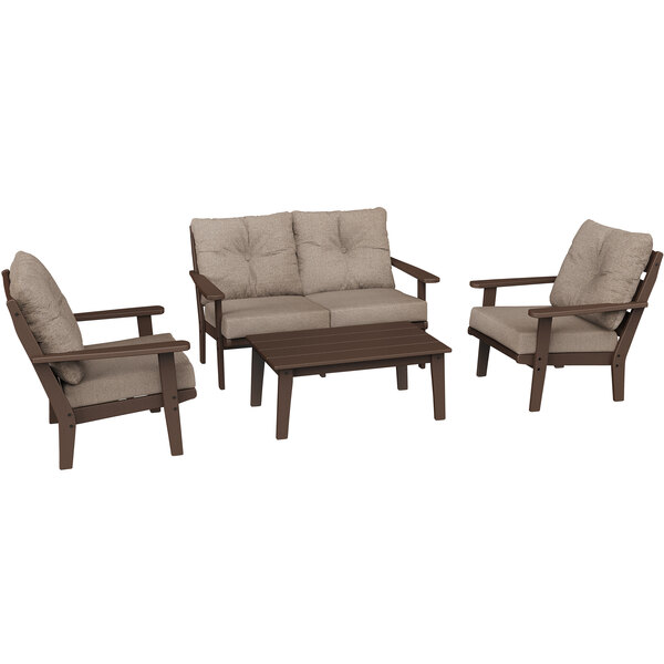 A POLYWOOD Lakeside deep seating set with a table, chairs, and loveseat with cushions.