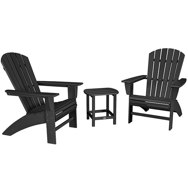 A group of three black POLYWOOD Nautical Adirondack chairs and a table.