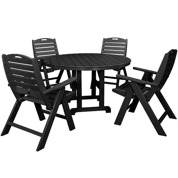 A POLYWOOD black outdoor dining set with four folding chairs on a wood deck.