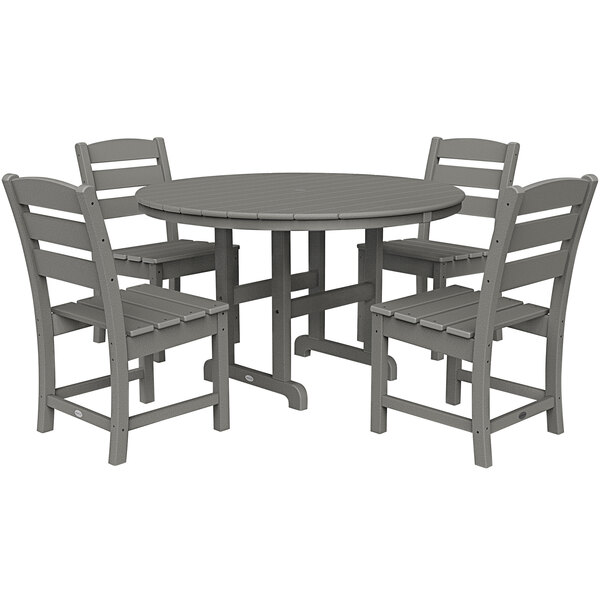 A POLYWOOD slate grey outdoor dining set with a round table and four chairs.