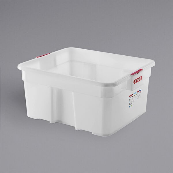 An Araven white plastic food storage container with red handles.