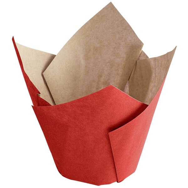 A Novacart ecru paper baking cup with a red and tan paper wrapper.