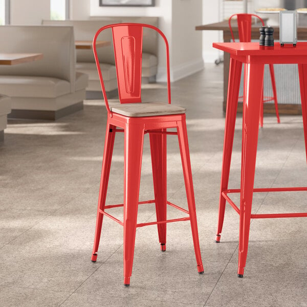 Lancaster Table & Seating Alloy Series Ruby Red Indoor Cafe Barstool with Gray Wood Seat
