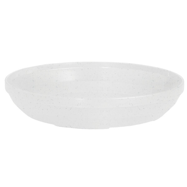 A white bowl with speckled specks on the surface.