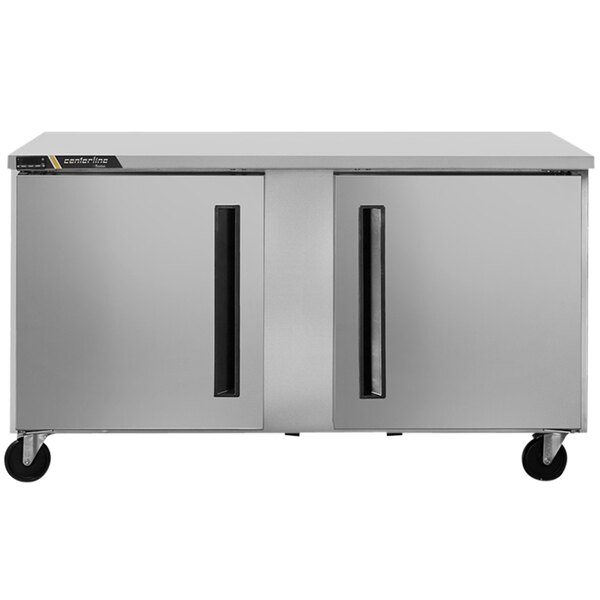 A stainless steel Traulsen undercounter freezer with two doors and black handles.