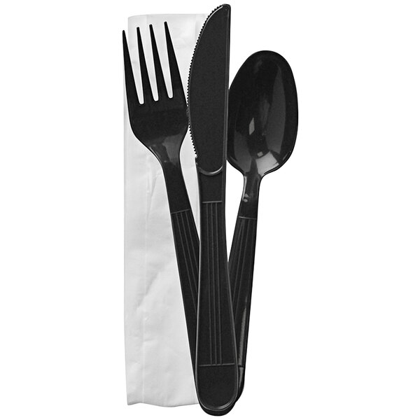 Fineline ReForm black plastic utensils wrapped with napkin.