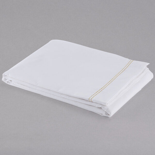 A folded white Oxford Superblend microfiber king size flat sheet with yellow stitching on top.