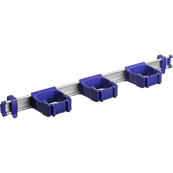A white Toolflex rack with three purple One-Size-Fits-All holders.
