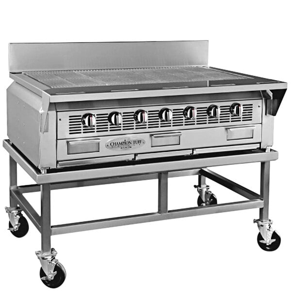 A Champion Tuff stainless steel countertop charbroiler with four burners.