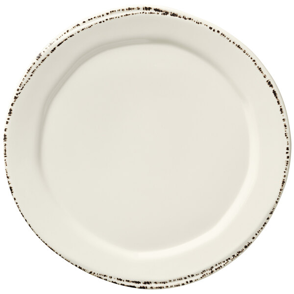 A white Libbey melamine plate with brown speckled edges.