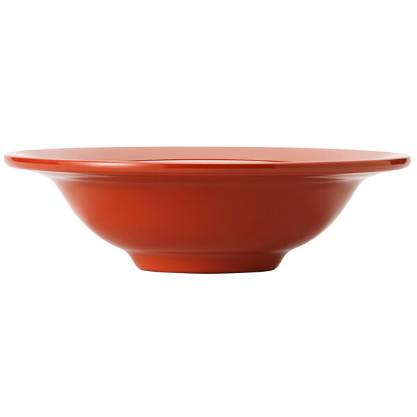 A white melamine bowl with a red rim.