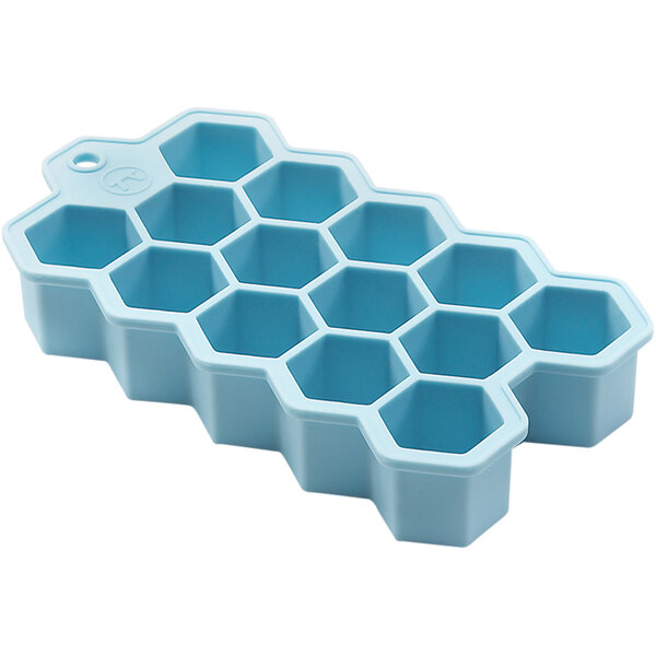 A blue Outset silicone hexagon ice mold with 14 compartments.