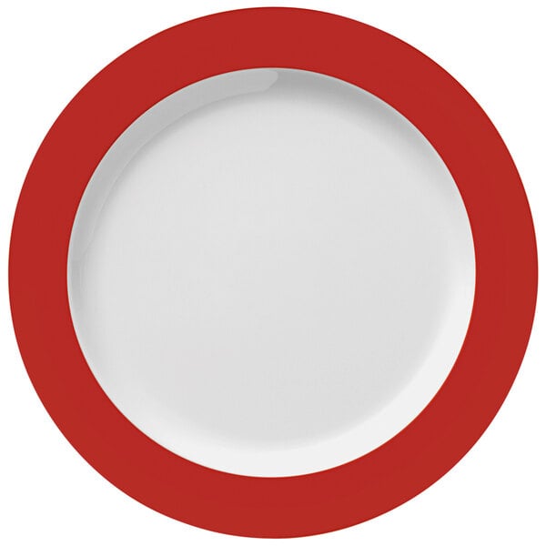 A white melamine plate with a red rim.