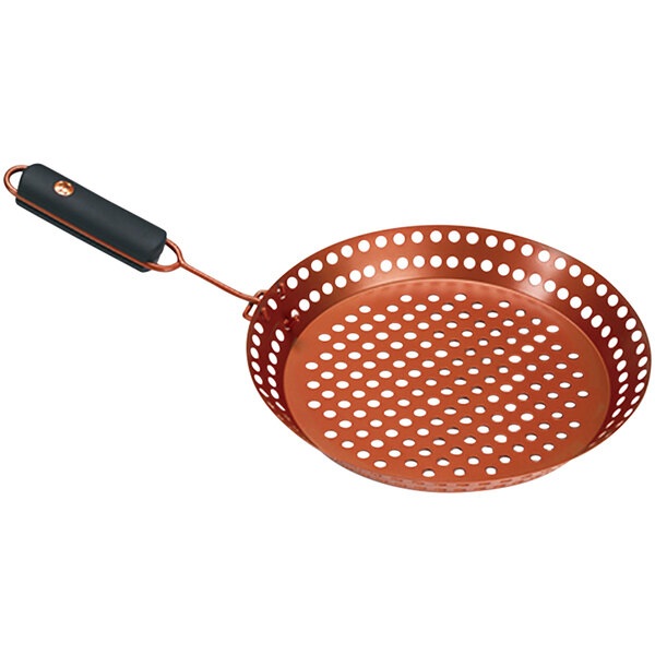 An Outset copper grill skillet with a removable handle.