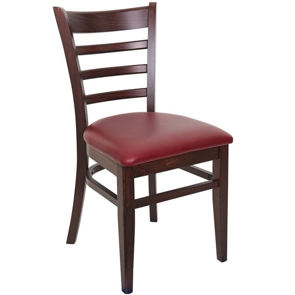 A BFM Seating Berkeley beechwood restaurant chair with a burgundy vinyl seat.