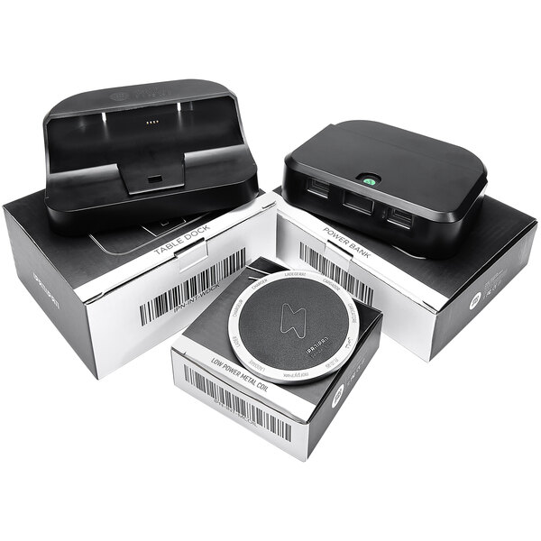 Three black rectangular BFM Seating wireless charging devices with barcodes.