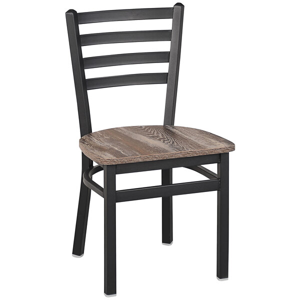 A BFM Seating black steel ladder back chair with a wood seat.