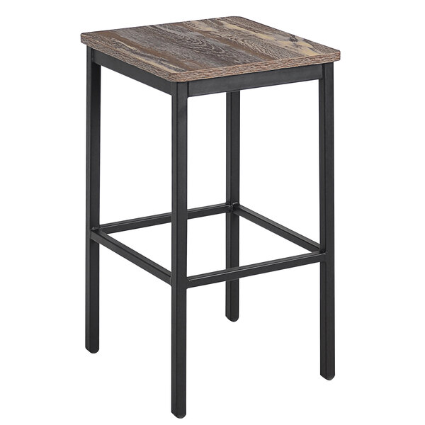 A BFM Seating black steel backless barstool with a wood seat.
