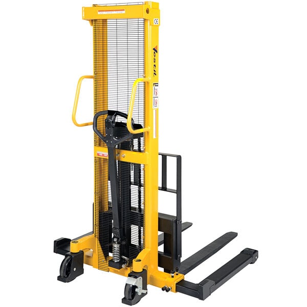A yellow and black Vestil manual hydraulic fork stacker with black handle.