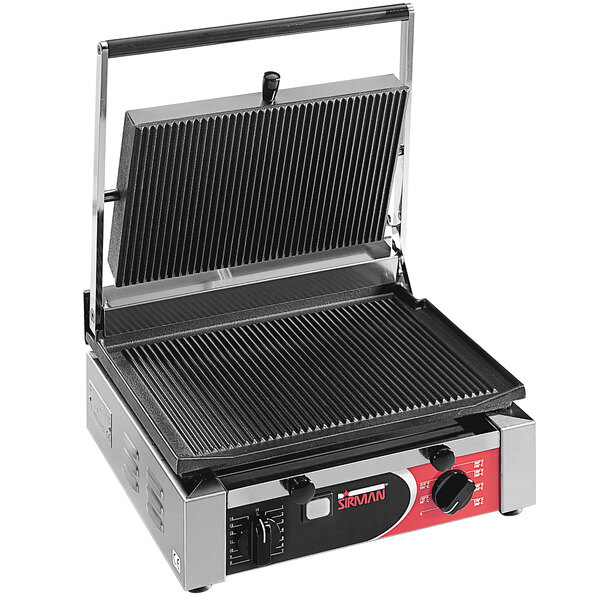 A black and silver Sirman CORT R Single Panini Grill on a table in a professional kitchen.