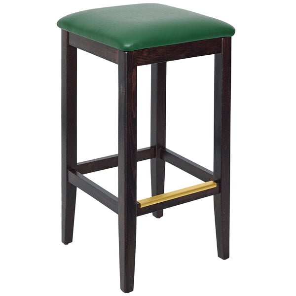 A BFM Seating Stockton beechwood bar stool with a green vinyl seat.