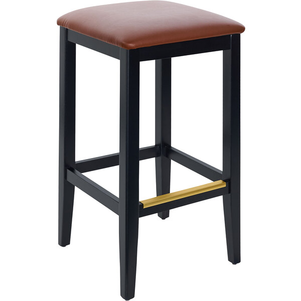 A black BFM Seating Stockton barstool with a light brown vinyl seat.