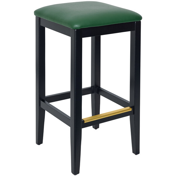 A BFM Seating black beechwood barstool with a green cushion.