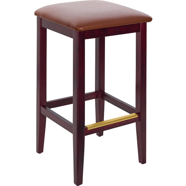 A BFM Seating dark mahogany beechwood bar stool with a light brown vinyl seat.