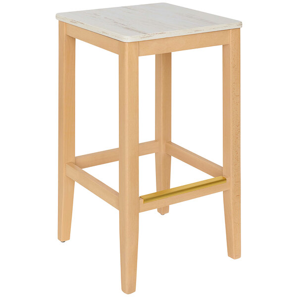A BFM Seating wooden barstool with a beige seat.