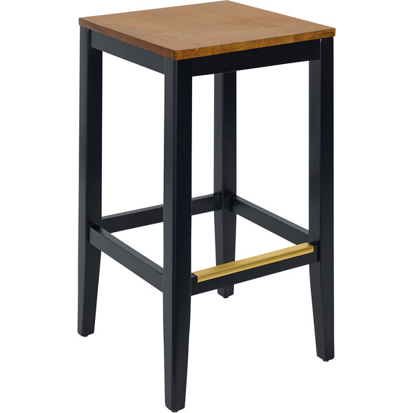 A black BFM Seating Stockton bar stool with a wooden seat