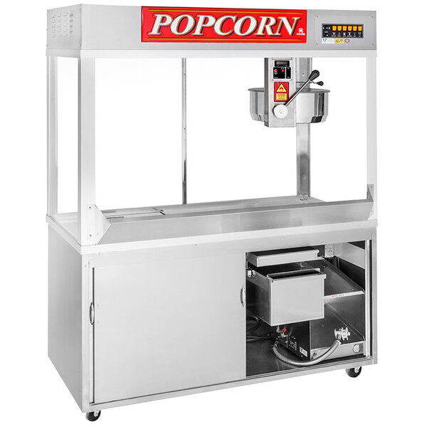 A Cretors popcorn popper with a stainless steel cabinet and a large container.