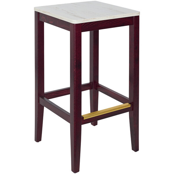 A BFM Seating dark mahogany beechwood barstool with a relic antique wash seat.