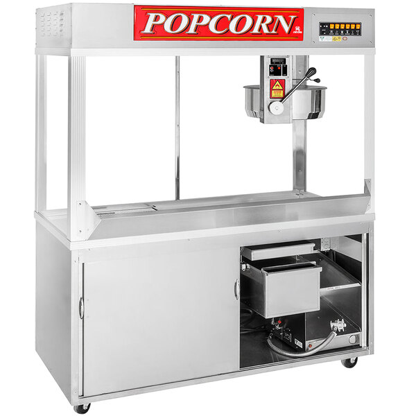 A Cretors popcorn popper with a stainless steel cabinet.