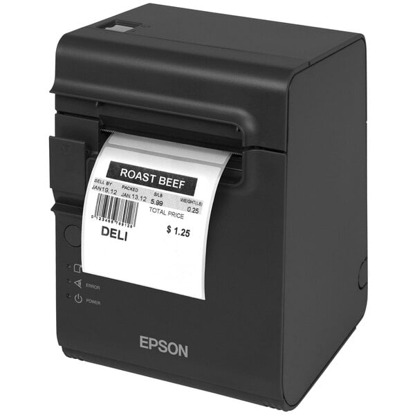 An Epson TM-L90 Plus thermal label and barcode printer on a counter with a price tag.