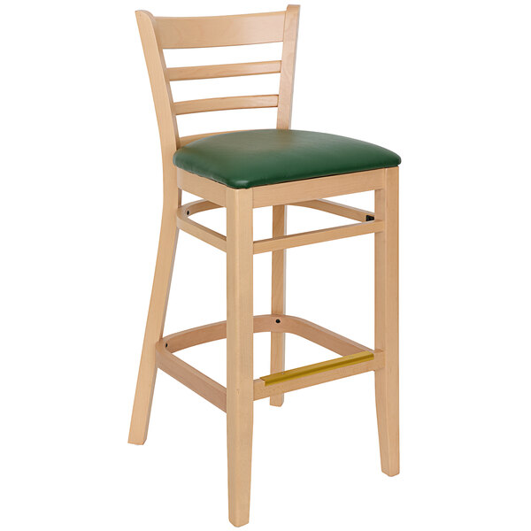 A BFM Seating Berkeley natural beechwood barstool with a green vinyl seat.