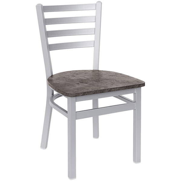 A white metal BFM Seating ladder back chair with a grey seat.