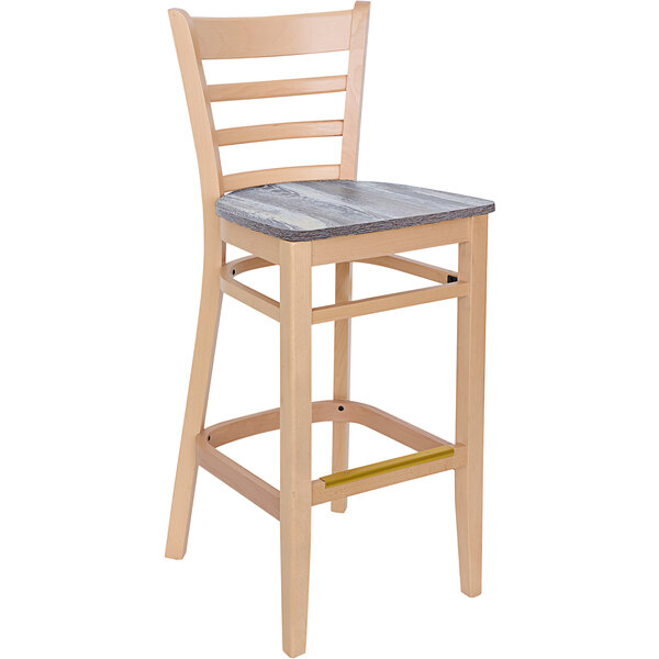 A BFM Seating Berkeley wooden barstool with a wooden seat and ladder back.