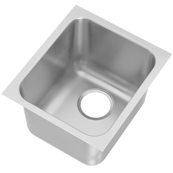 A Vollrath stainless steel sink bowl with a drain hole.