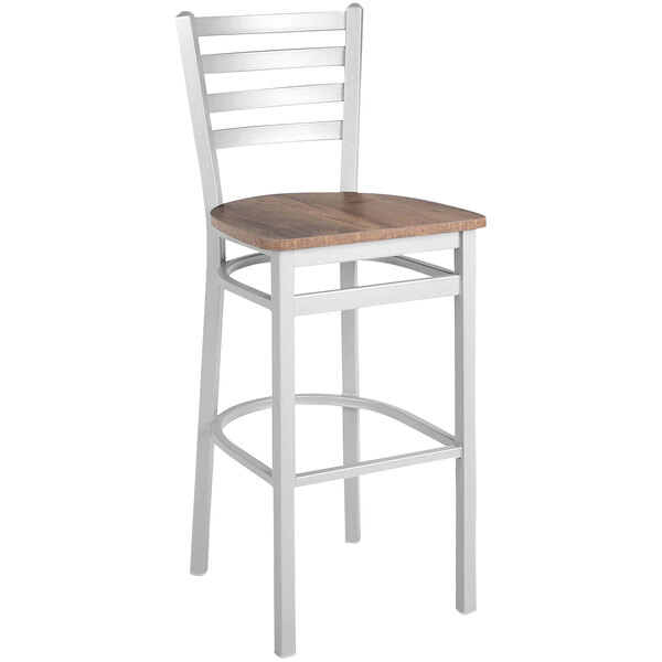 A white metal BFM Seating bar stool with a wooden seat.
