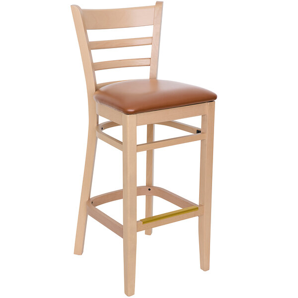 A BFM Seating Berkeley wooden barstool with a light brown cushion.