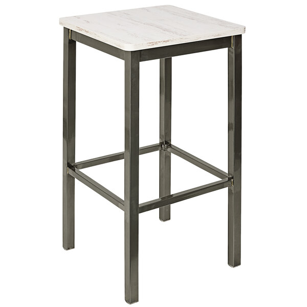 A BFM Seating backless barstool with a metal seat on a white table.