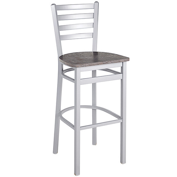 A BFM Seating metal ladder back barstool with a wooden seat.